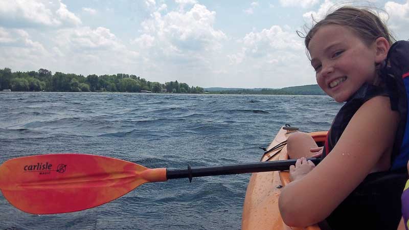 windy kayaking on lake bellaire